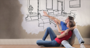 Couple Painting A Picture Of Their Perfect Home